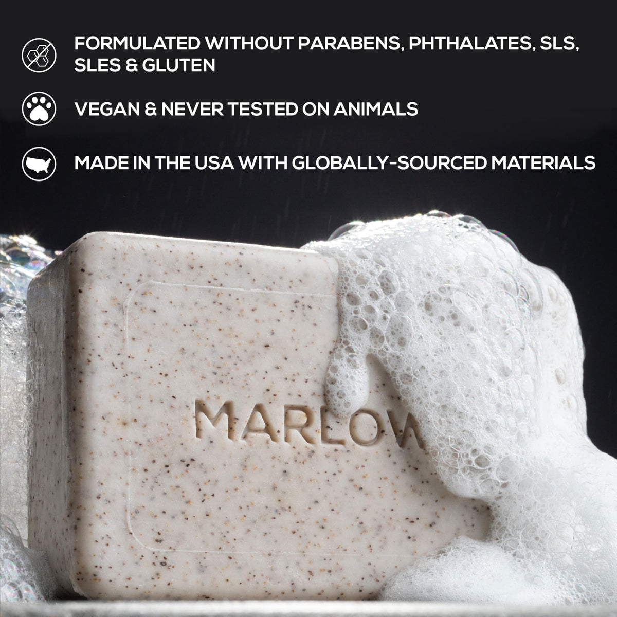 MARLOWE. close-up of scrub bar texture revealing apricot seed and pumice