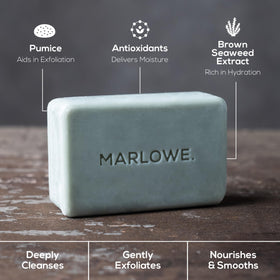 MARLOWE. single bar held in hand to show 7 oz scale, durable benefit