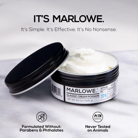 MARLOWE. pomade on hand being applied to hair showing ease of styling benefit