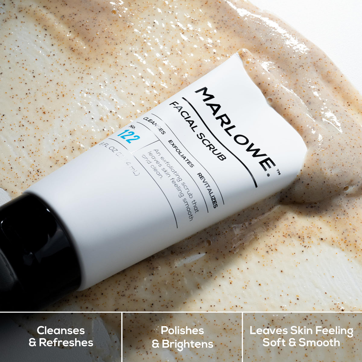MARLOWE. pouring scrub onto palm demonstrating easy dispensing and rinse-friendly formula