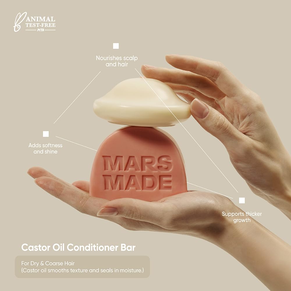 MARS MADE conditioner bar in hand for scale demonstrating compact travel convenience