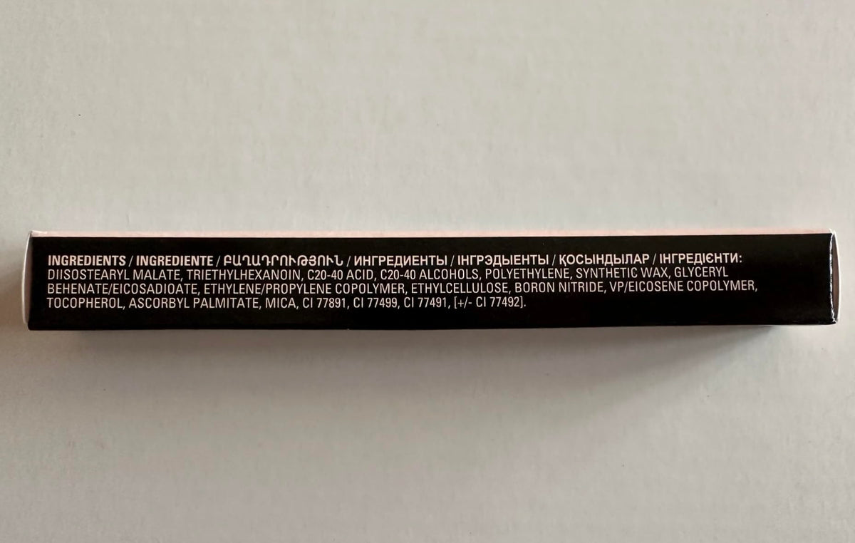 Mary Kay Signature Brow Liner blonde held in hand to show compact travel-friendly size