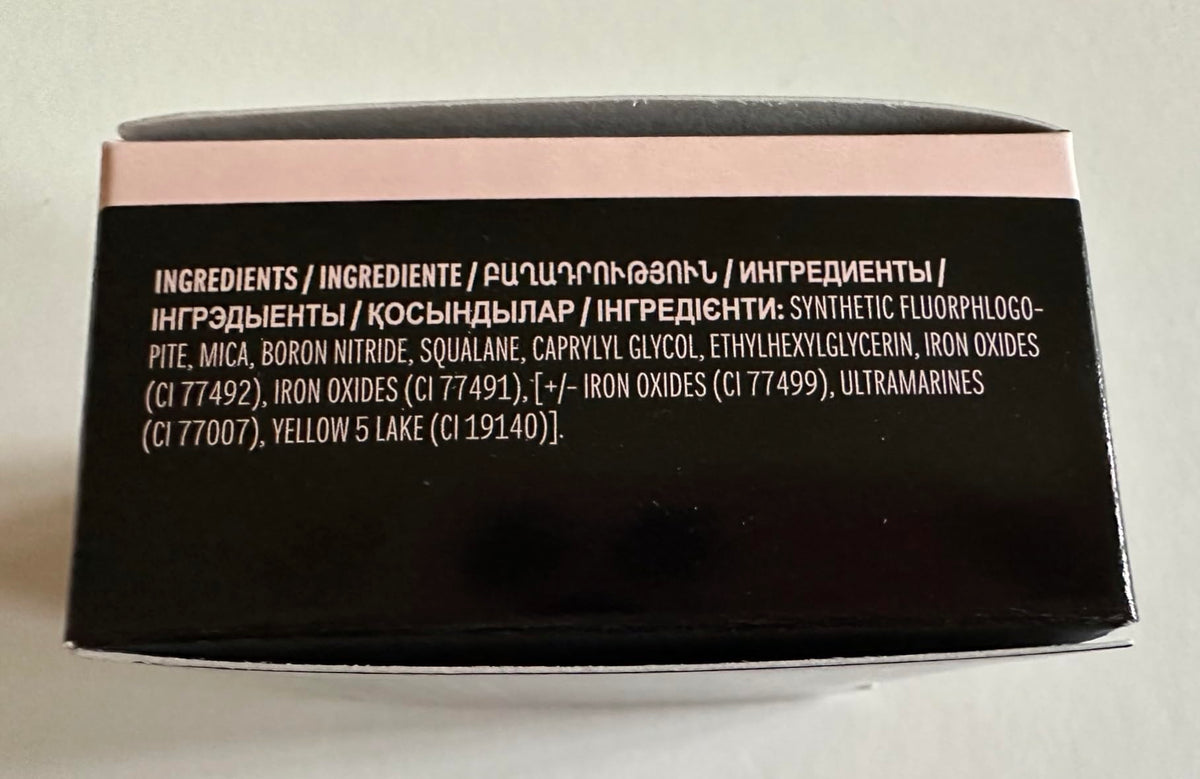 Mary Kay Silky Setting Powder on vanity with mirror portraying everyday use and photo-ready results