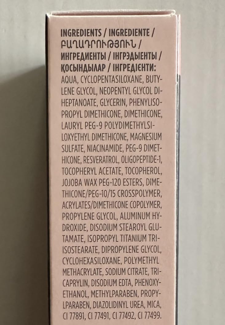 Mary Kay foundation beside a coin to show 1 fl oz size and travel-friendly benefit