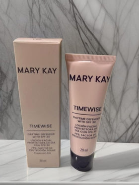 Mary Kay Timewise bottle next to common items for size reference