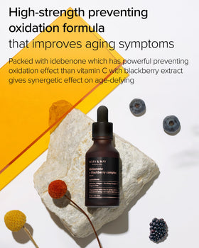 Mary&May bottle beside blackberry sprigs highlighting 20% blackberry antioxidant complex benefit