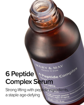 Mary&May dropper dispensing serum, close-up showing precise, no-waste application
