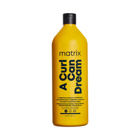 MATRIX front packaging showing conditioner for defined waves and lightweight hydration