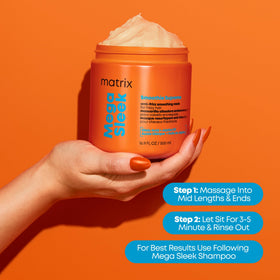 Matrix jar beside hand for scale showing 16.9 fl oz travel-friendly size