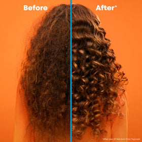 Matrix applying serum to damp hair before blow-drying for protection