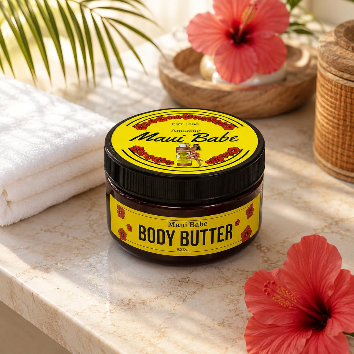 Maui Babe jar on beach towel conveying tropical scent and relaxation benefit