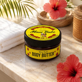Maui Babe jar on beach towel conveying tropical scent and relaxation benefit