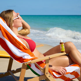Maui Babe Kona coffee and kukui ingredients displayed for tanning support