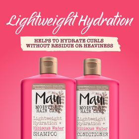 Maui Moisture being applied to wet curly hair for detangling benefit