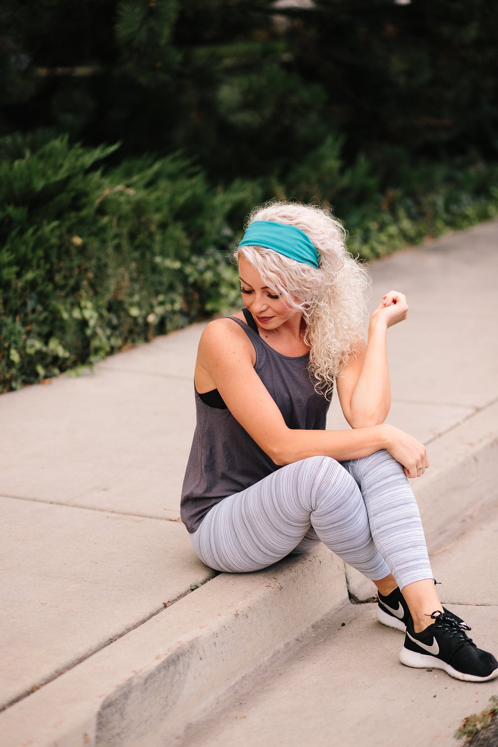 Maven Thread headband on woman doing yoga showing secure, non-slip fit