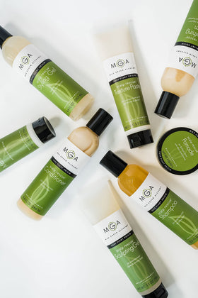 Max Green Alchemy on bathroom shelf in lifestyle scene suggesting everyday grooming use