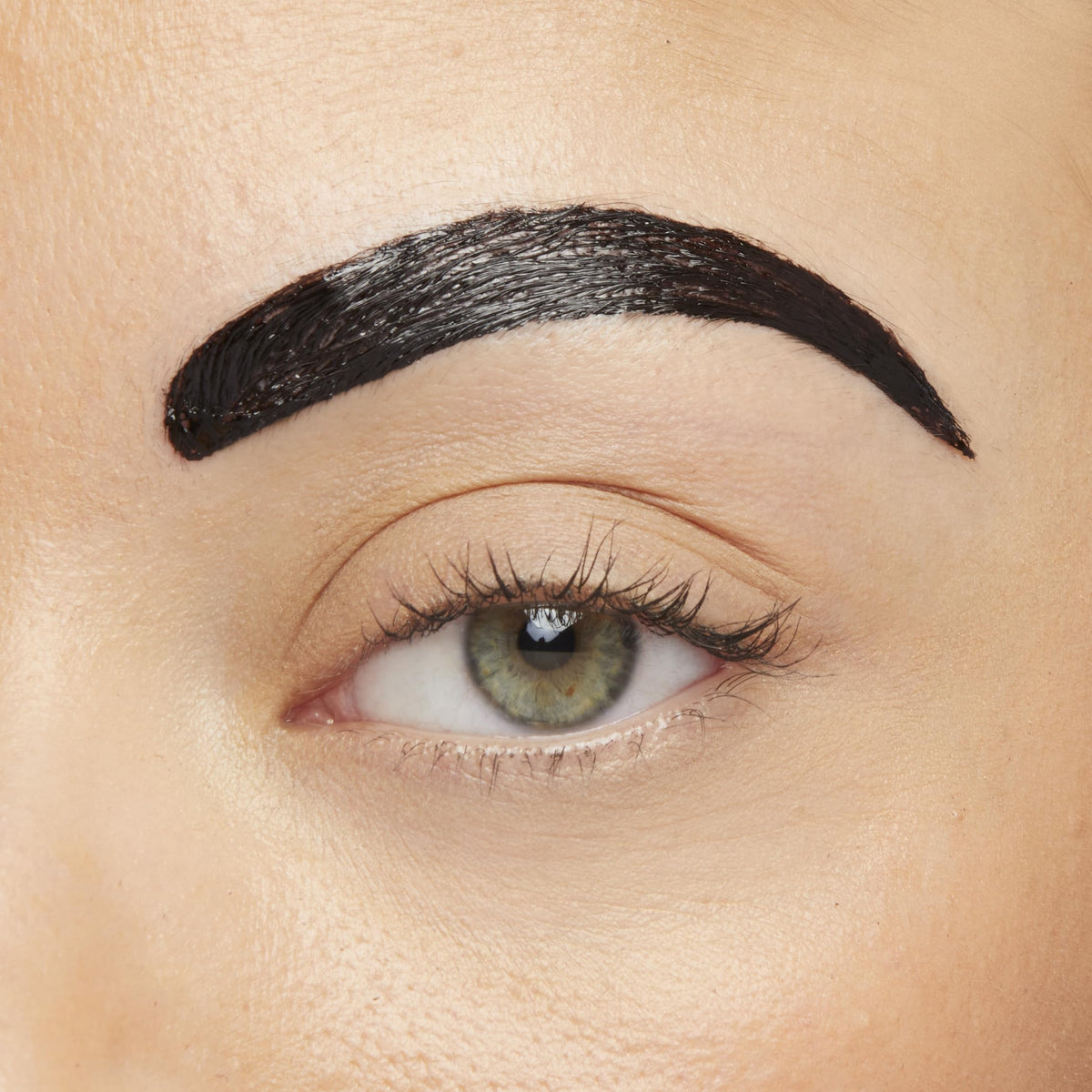 Maybelline Brow Tattoo application brush in use demonstrating easy shaping