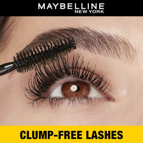MAYBELLINE mascara held in hand to show compact 0.32 fl oz size and portability