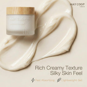 MAY COOP hand applying cream to skin demonstrating fast absorption benefit