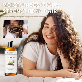 MAYJAM jojoba oil massaged into cuticles to strengthen nails and restore softness