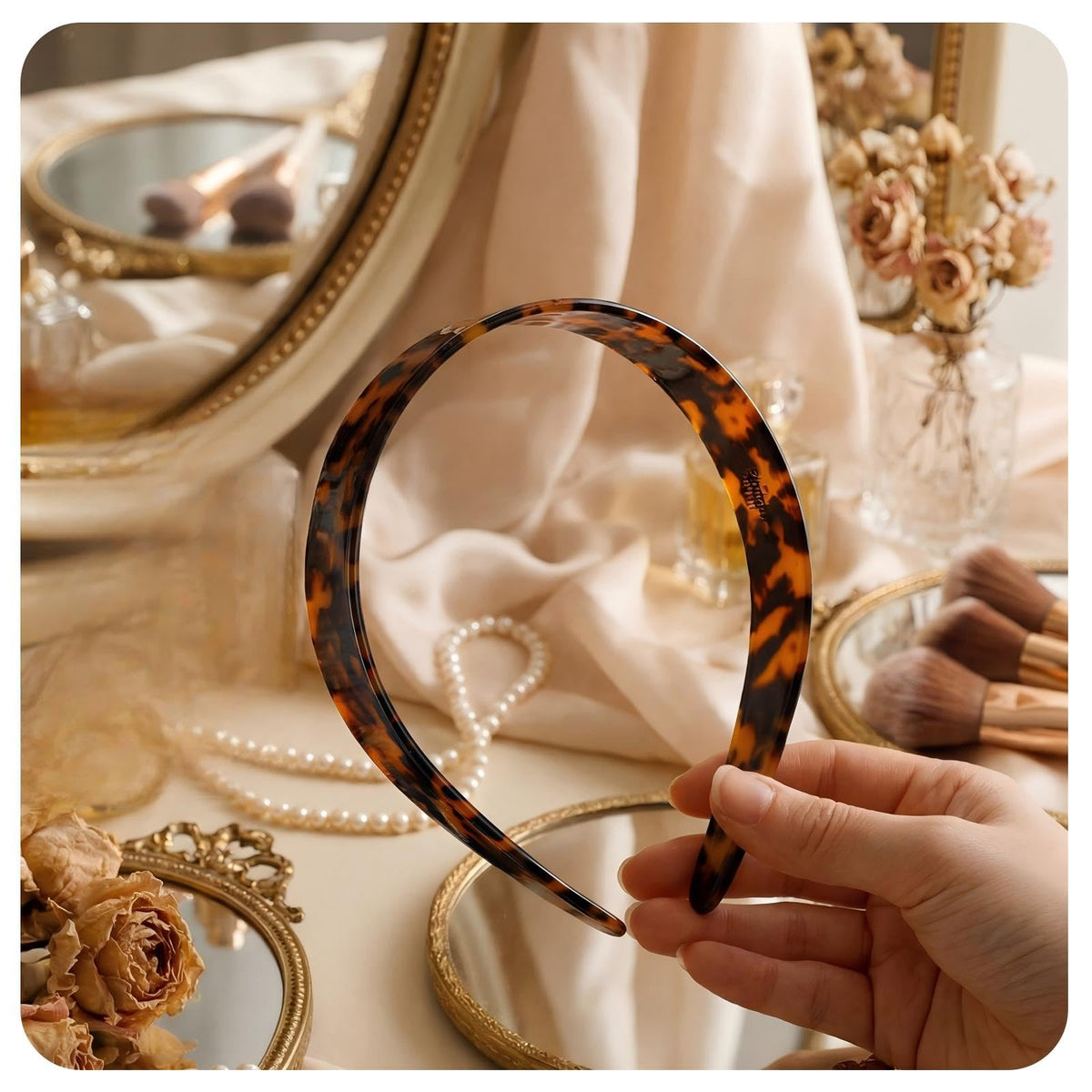 Maysing headband in hand for scale showing lightweight, portable benefit
