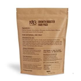 MB Herbals herbal paste applied to hair for nourishing treatment