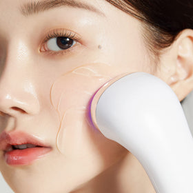 medicube serum applied with device demonstrating enhanced absorption