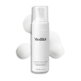 Medik8 bottle on bathroom counter staged in routine showing everyday use benefits