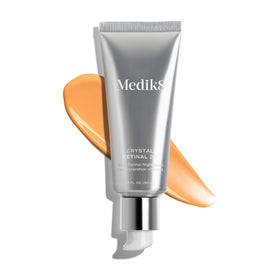Medik8 Crystal Retinal 20 held in hand to show 1 oz scale and travel convenience