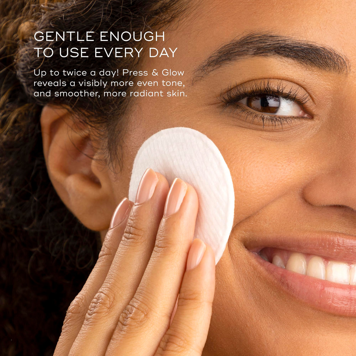 Medik8 press and glow bottle in hand for true size and travel-friendly benefit