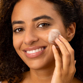 Medik8 product placed on bathroom shelf with towel to show routine-ready, refreshing cleanser