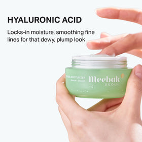 Meebak gel on hand being smoothed in showing non-greasy hydration effect