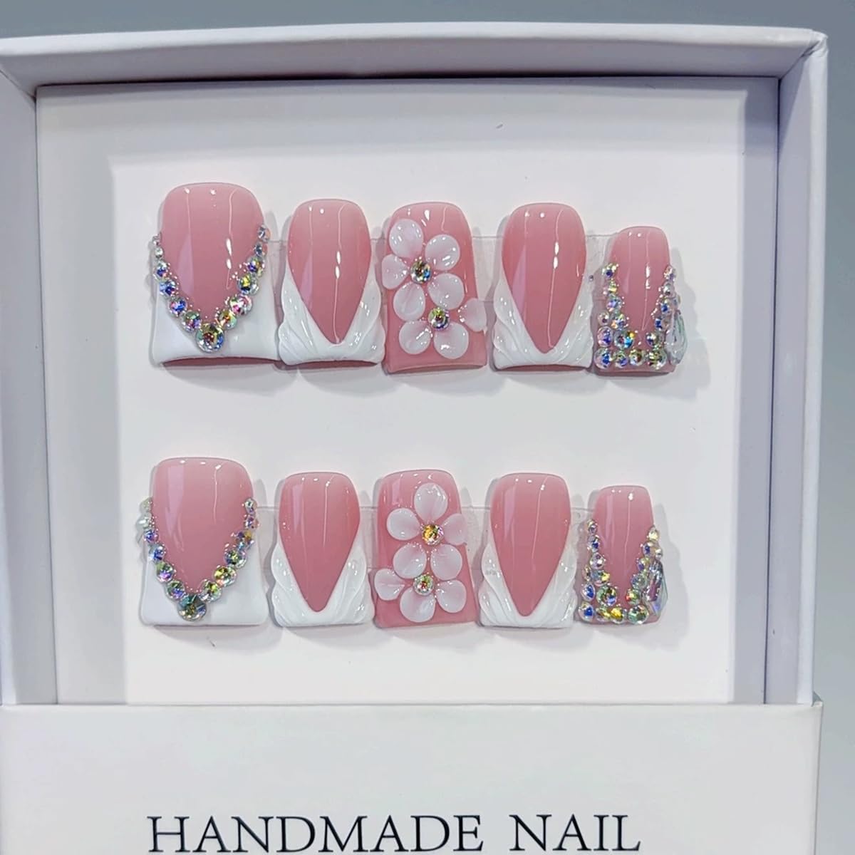 meemooron close-up of 3D flower rhinestones highlighting decorative detail and sparkle