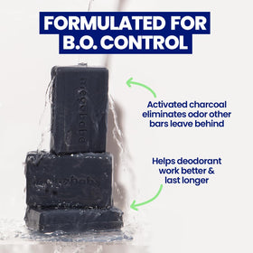Megababe Space Bar charcoal texture close-up highlighting detoxifying granules