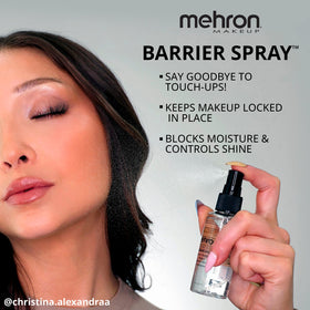 Mehron Barrier Spray held in hand to show 9 fl oz scale and travel-ready size