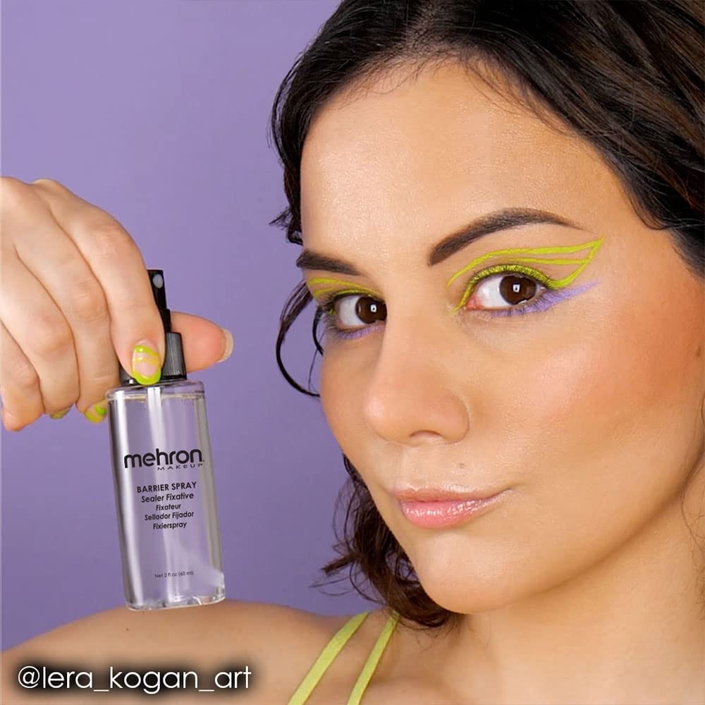 Mehron bottle among makeup kit items highlighting pro kit compatibility