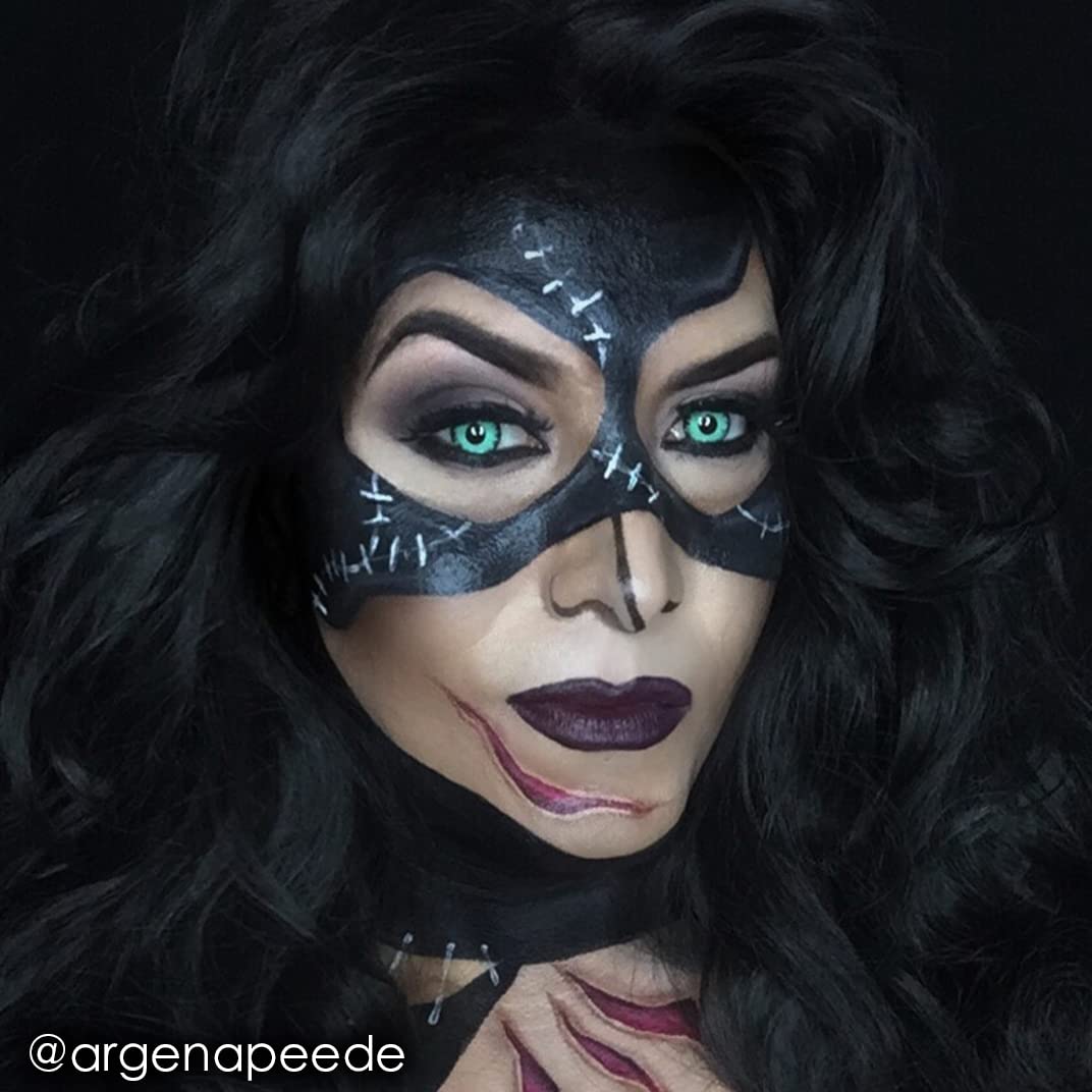 Mehron CreamBlend Stick applied on model's face demonstrating bold black coverage
