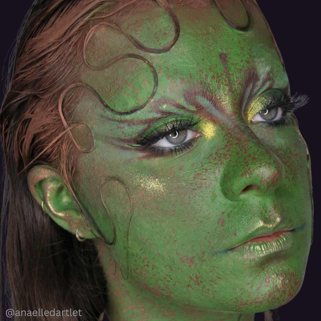 Mehron paint in airbrush cup, demonstrating airbrush-ready dilution and flow