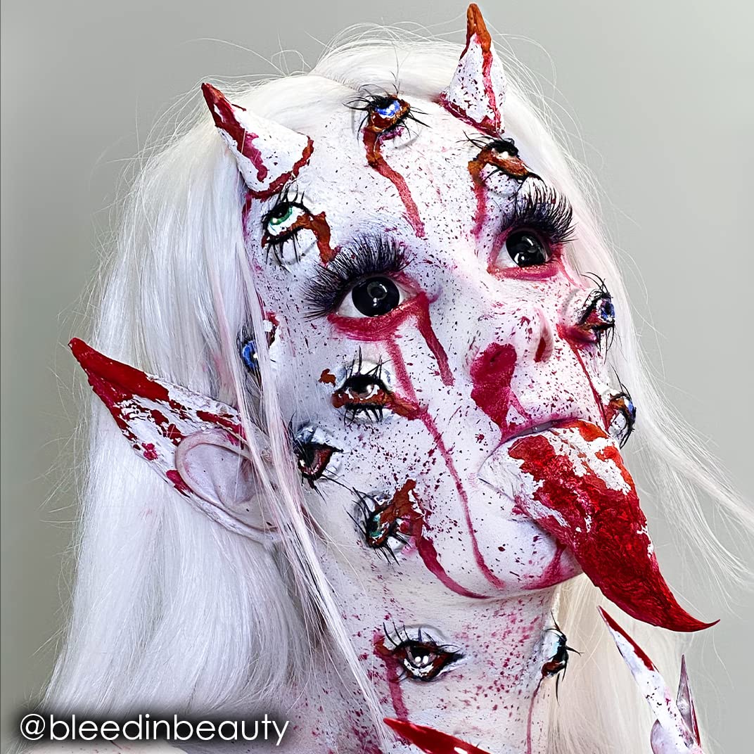 Mehron Paradise white being applied with brush for precise theatrical detail benefit