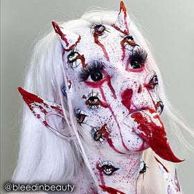 Mehron Paradise white being applied with brush for precise theatrical detail benefit