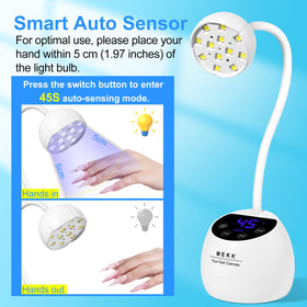MEKK lamp held in hand to show small size and easy travel convenience