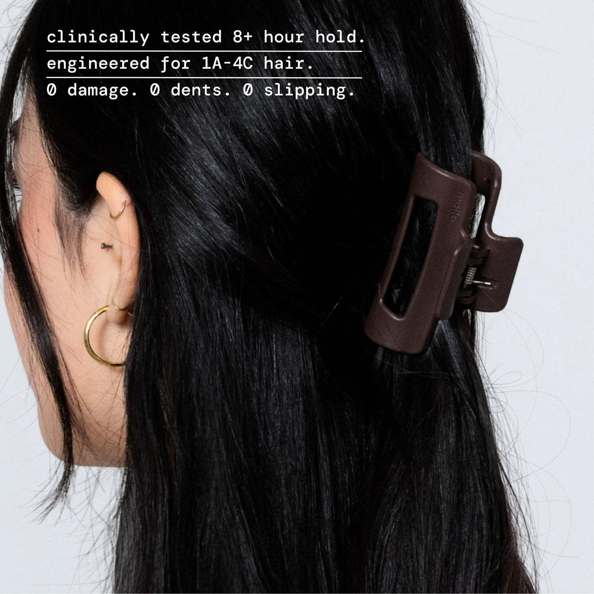MELLO clip flexing flat against a car headrest for comfortable wear