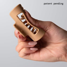 MELLO close-up of inward-curving teeth and matte finish for gentle grip