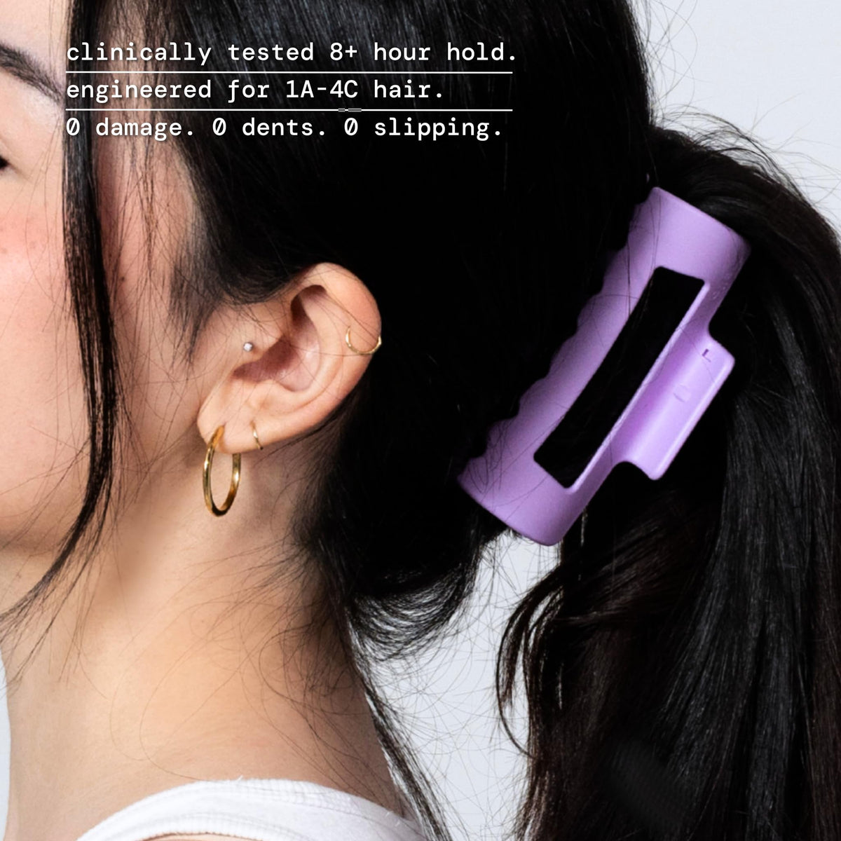 MELLO side profile showing inward-curving teeth that reduce scalp pressure for comfort