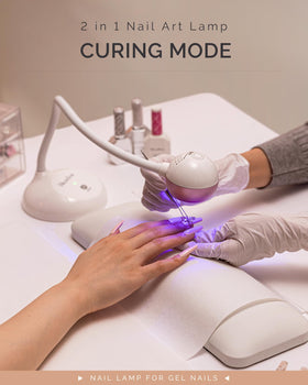 MelodySusie lamp curing rhinestone glue on a nail for precise embellishment setting
