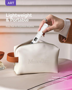 MelodySusie held in hand showing portable size for on-the-go use
