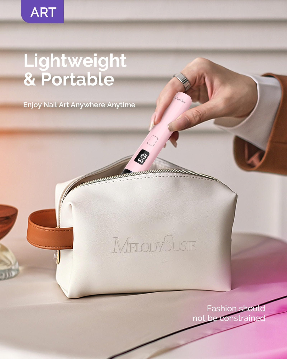 MelodySusie held in hand to show true portable size for travel convenience