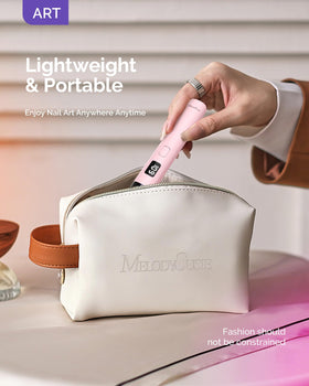 MelodySusie held in hand to show true portable size for travel convenience