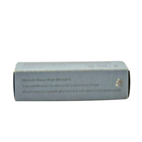 MERIT bronze balm inside a makeup bag showing compact travel-friendly size