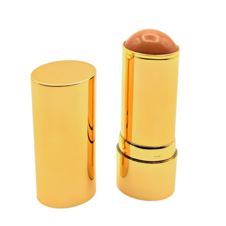 MERIT bronze balm front packaging showing compact design and clean branding